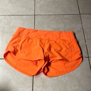 Orange Speed Up Low Rise Lululemon shorts, size 6,